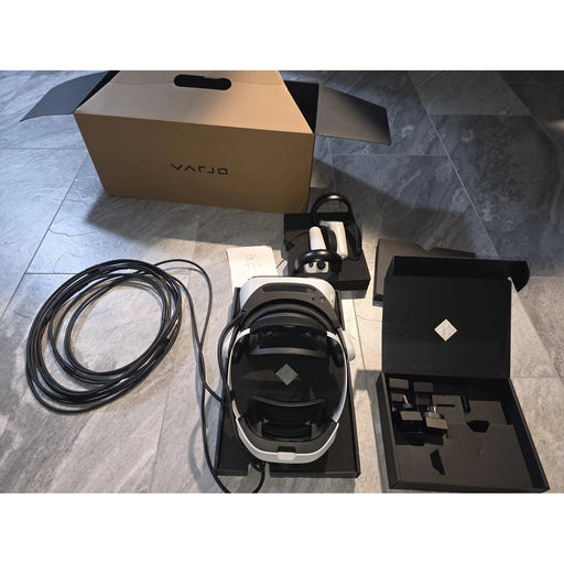 Pre-owned Varjo XR-4 Focal Edition complete kit with headset, controllers, cables, adapters, and original box